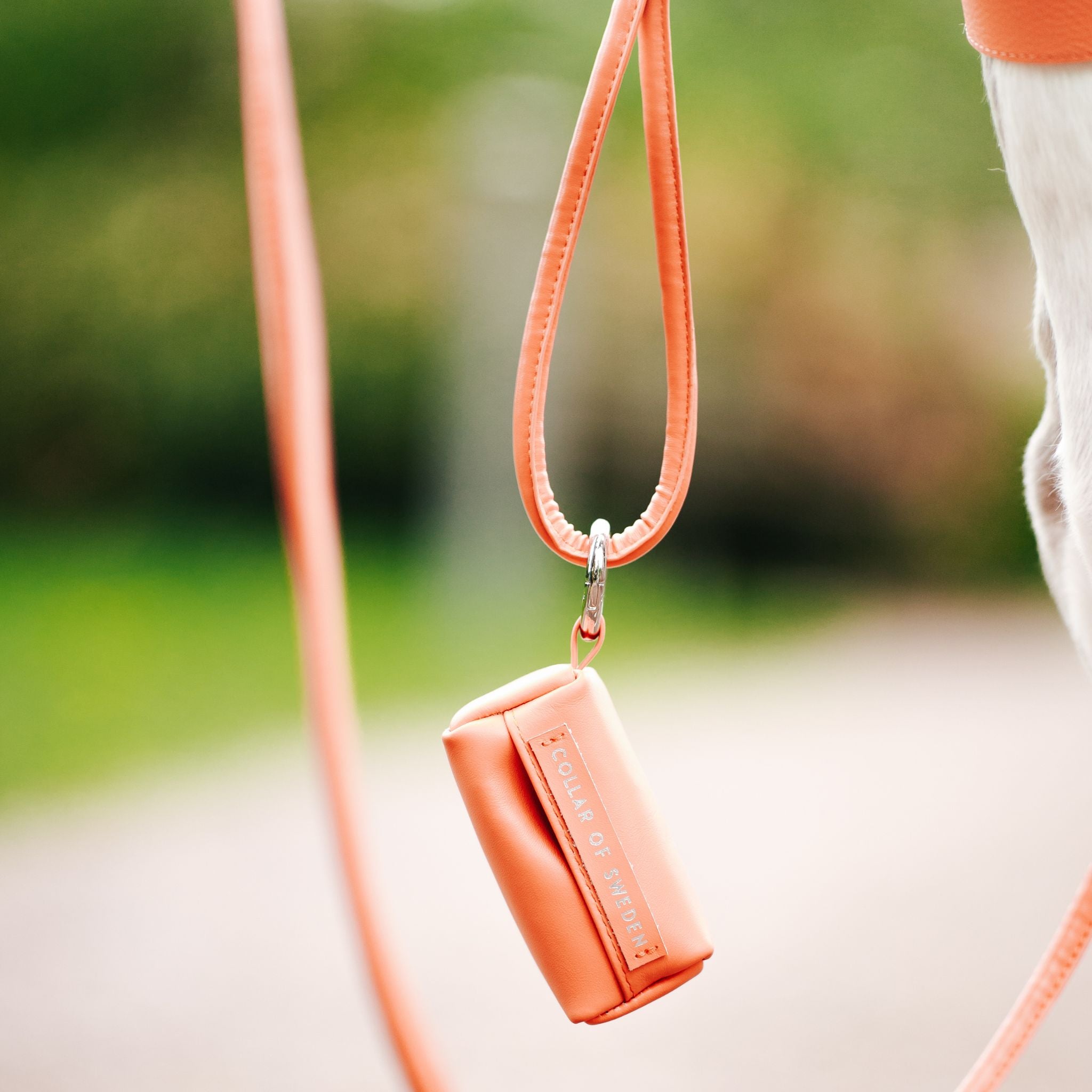 peach-poop-bag-holder-enviroment.jpg